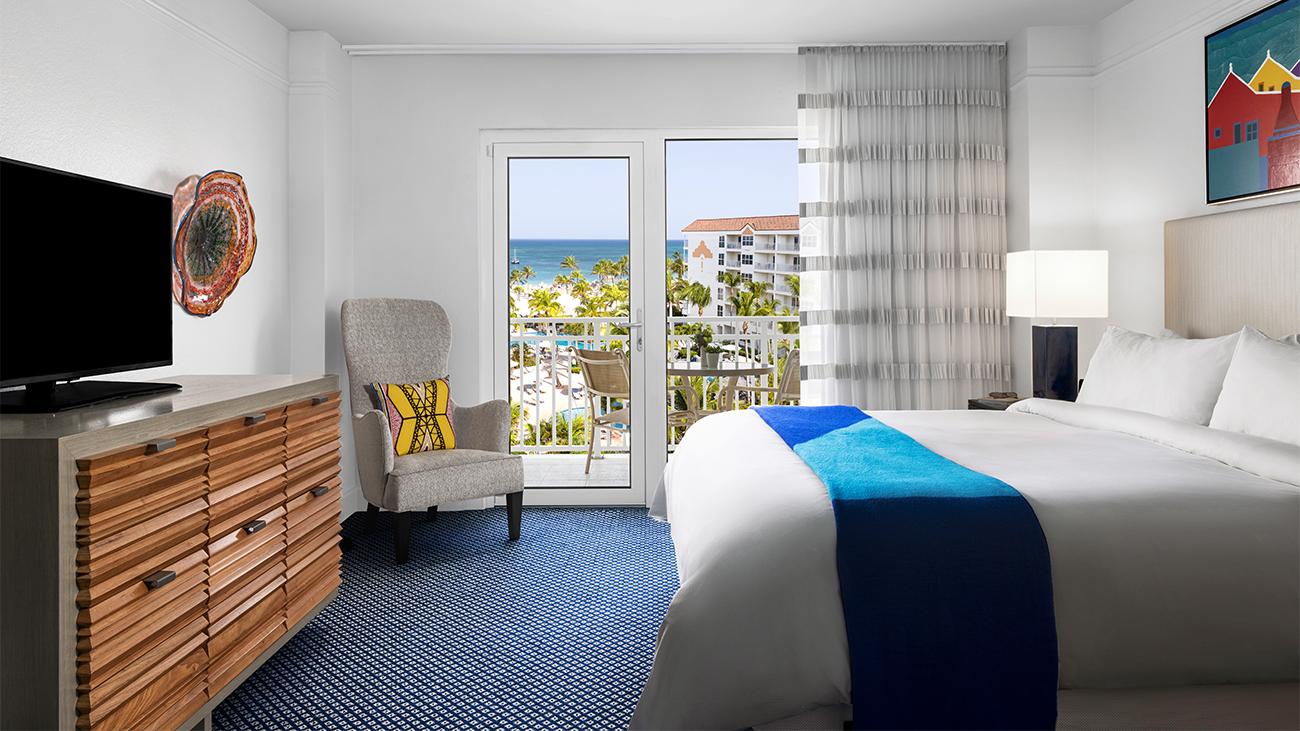 Primary Bedroom & Balcony (1- or 2-Bedroom Villa)